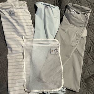 3 very good used condition Ollie Swaddles